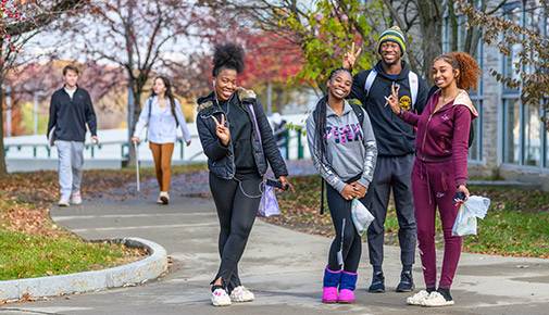 Students outside on campus in the fall
