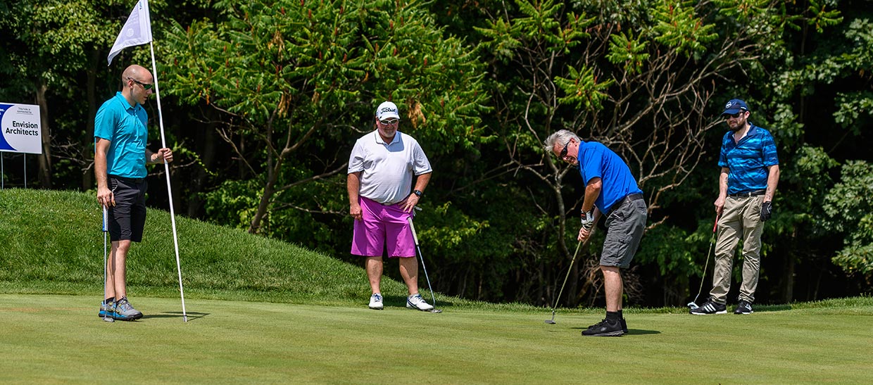 Golfers on the putting green
