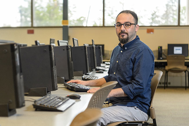 Saad M. in a computer lab