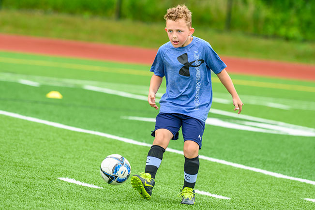 Cooper playing soccer