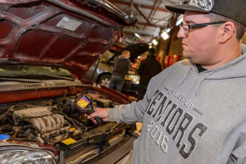 Student using the snap-on infra-red scanning tool