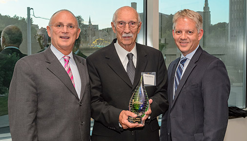 Doug Baldrey receiving the Outstanding Philanthropy Award from the College Foundation