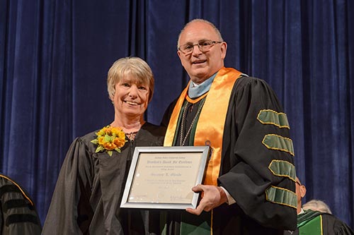 President Matonak presenting Suzanne Glaude her award