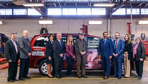 HVCC officials and Goldstein Auto Group management pose with donated vehicle