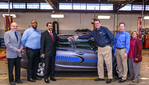 HVCC staff and members from Mohawk Honda in automotive lab