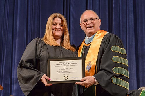 President Matonak presenting Jennifer Moss her award