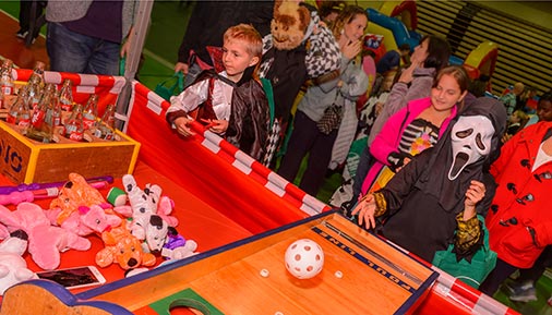 Kids in costume playing games