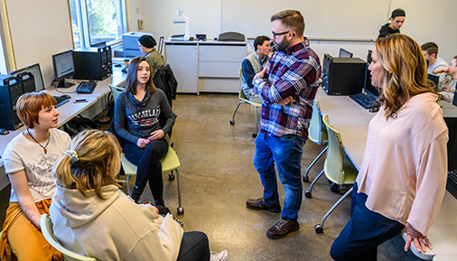Students talking with Jodi Mather and Richard Sweet