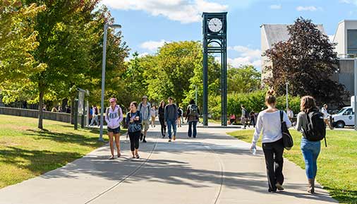 Students walking outside on campus
