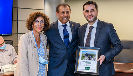 Greivin Arrieta Chacon poses with Regina LaGatta and President Ramsammy