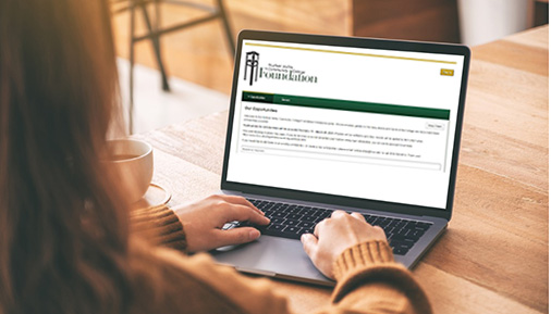 Girl completing online scholarship application