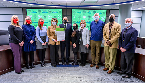 Leaders from HVCC and Living Resources with signed agreement